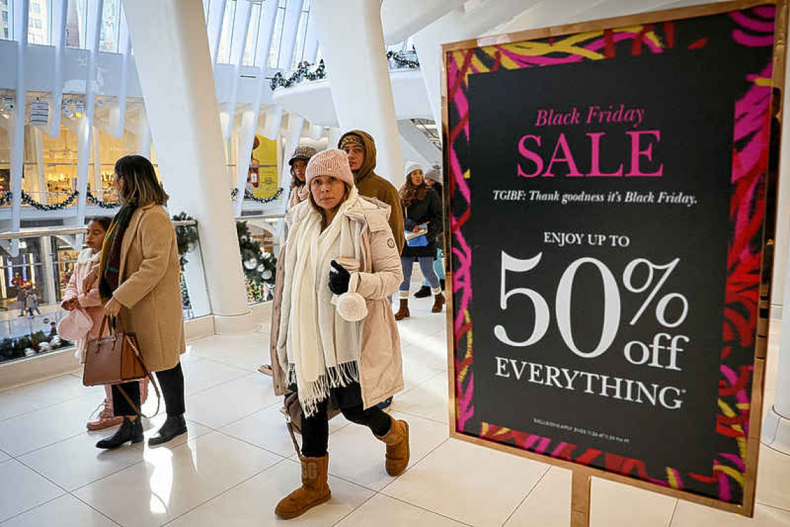 US shoppers click 'buy' as retailers slash prices ahead of Cyber Monday 